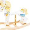 Le Toy Van Carrusel De Unicornios Mecedores - ^ Escalas